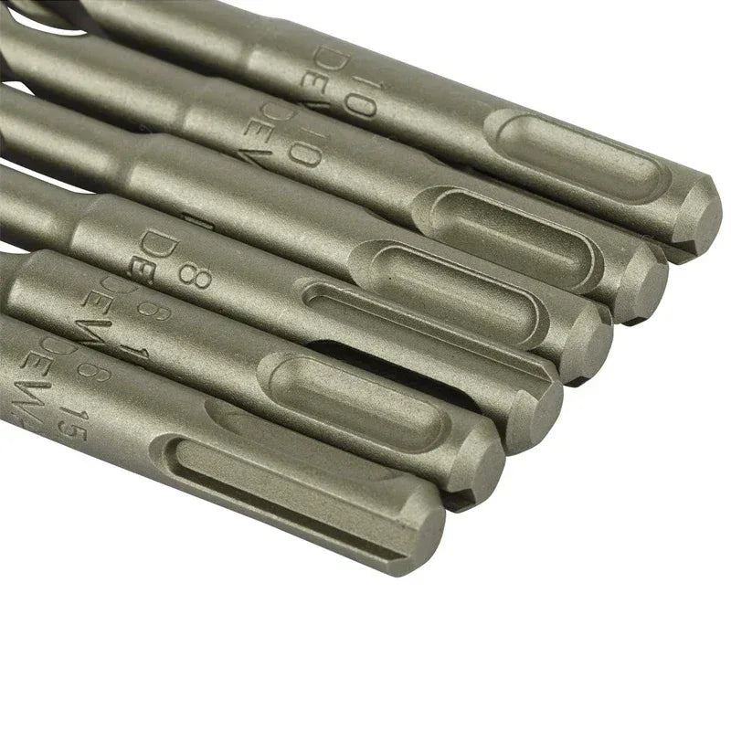 Set of drill bits with visible brand markings on a white background